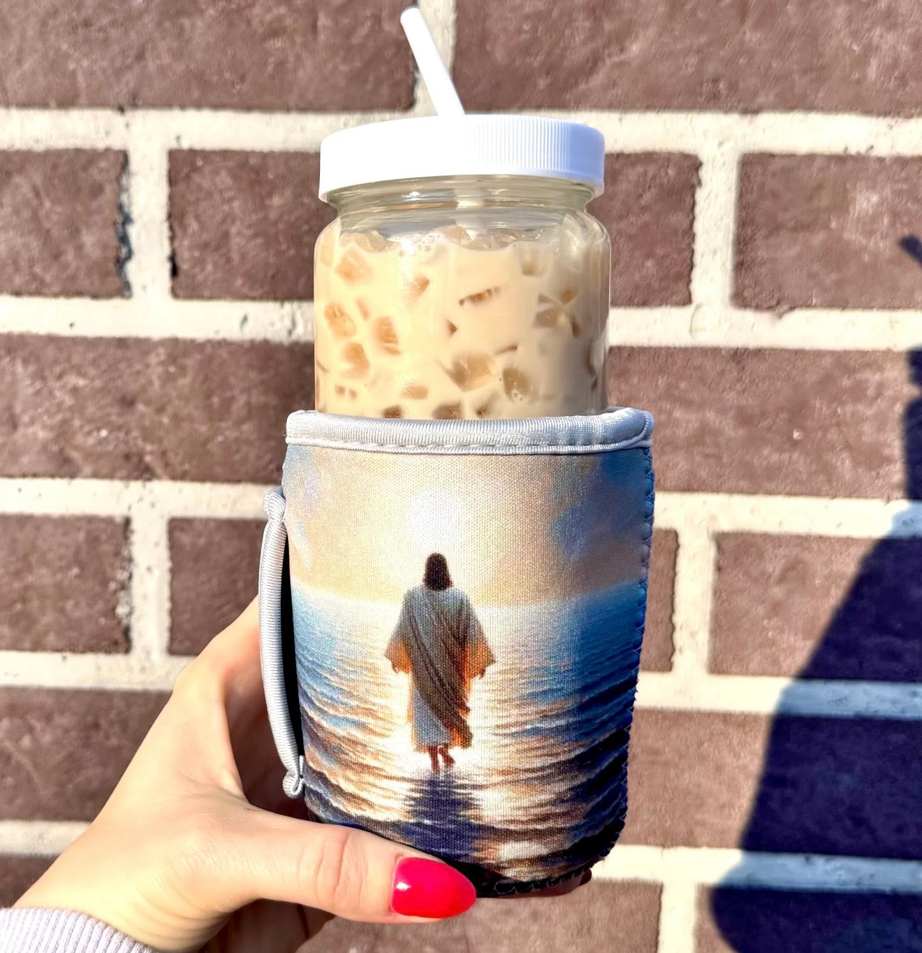 Jesus walking on water koozie