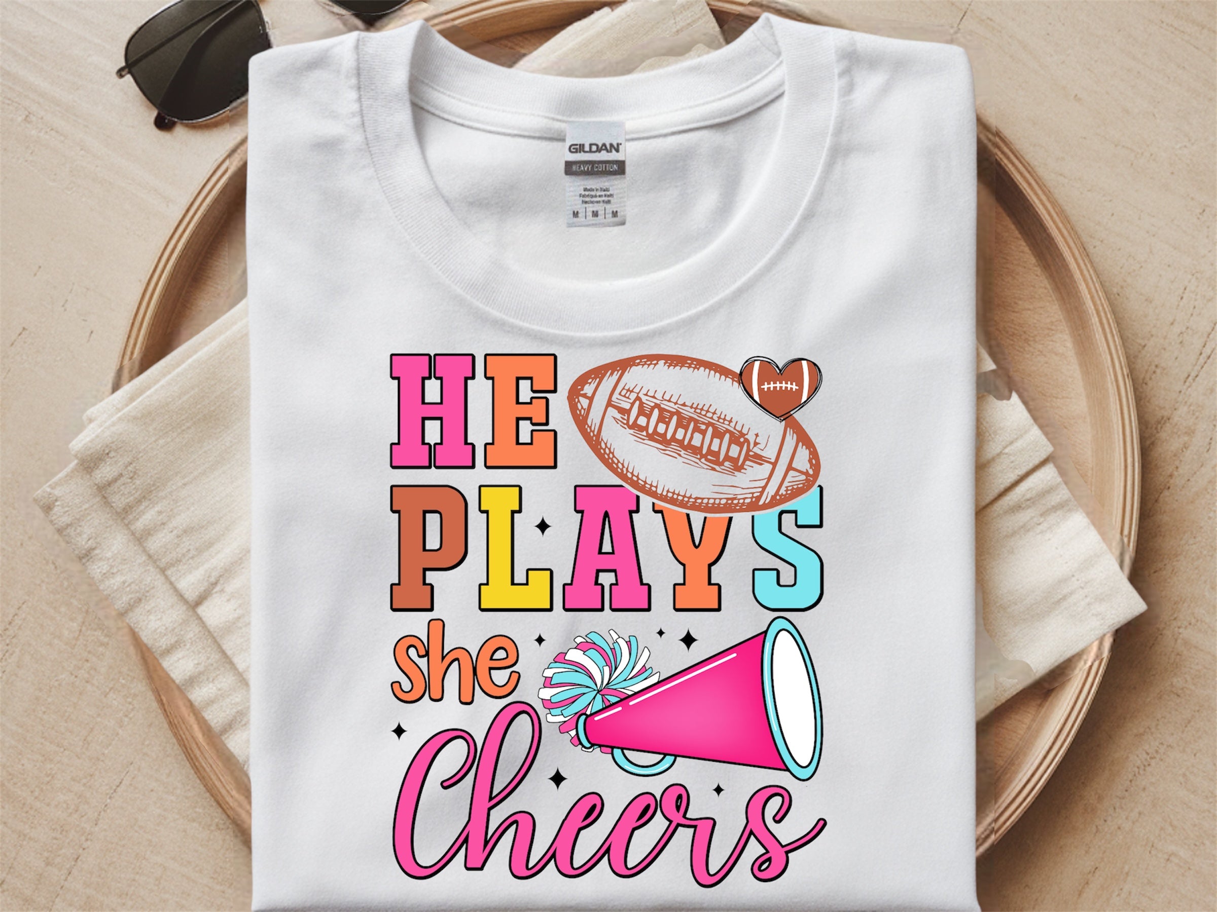 He plays, she cheers